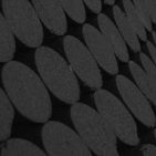 Dark gray circles on a black curving background