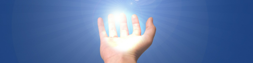 on a blue background an open palm holds a sun burst