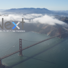 Aerial photo of the Golden Gate Bridge and San Francicso shrouded in clouds with the Google Next logo superimposed in the upper left